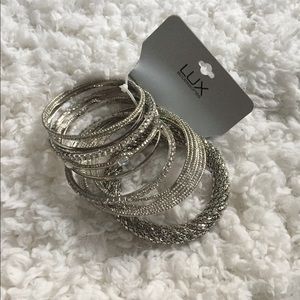 New package of lux silver/ rhinestone bracelet set